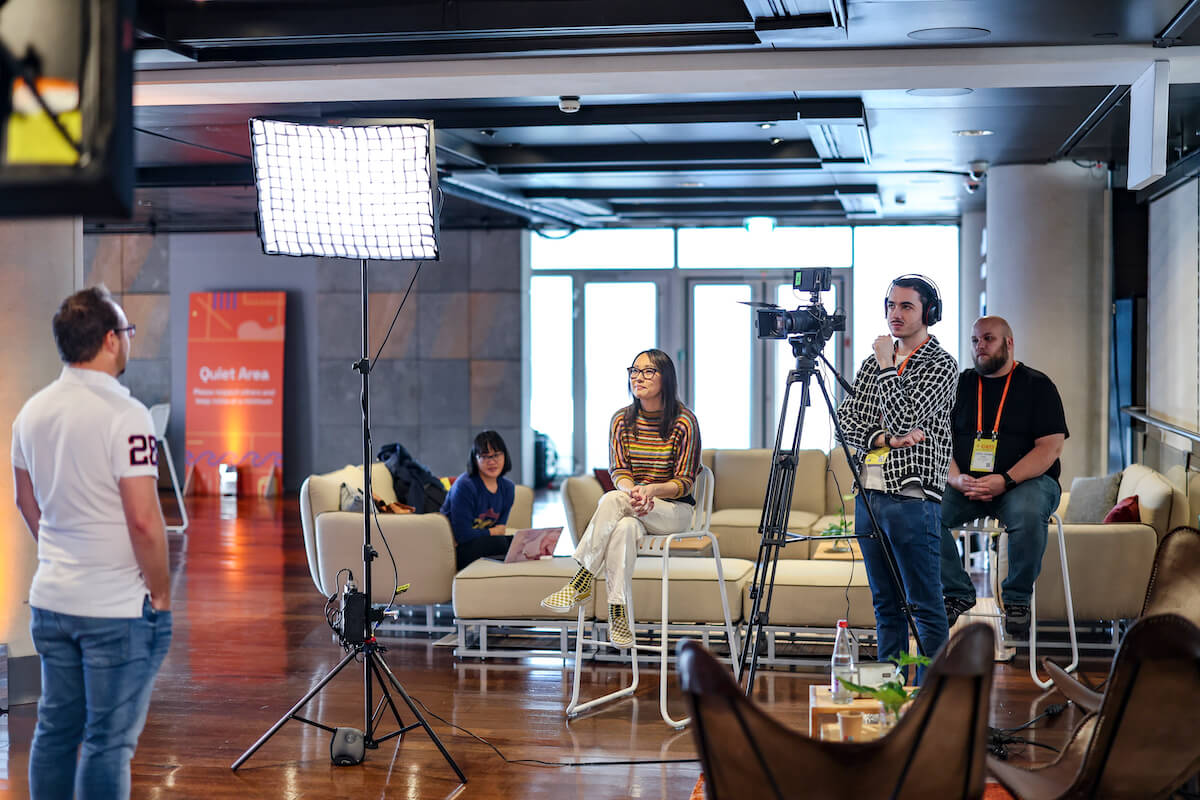 *Behind the scenes: The Grafana Labs team (including documentary director/producer Collins Pace, far right) interviews co-founder Anthony Woods for 'The Story of Grafana' in February.* Grafana Labs team in a filming set up for Story of Grafana documentary