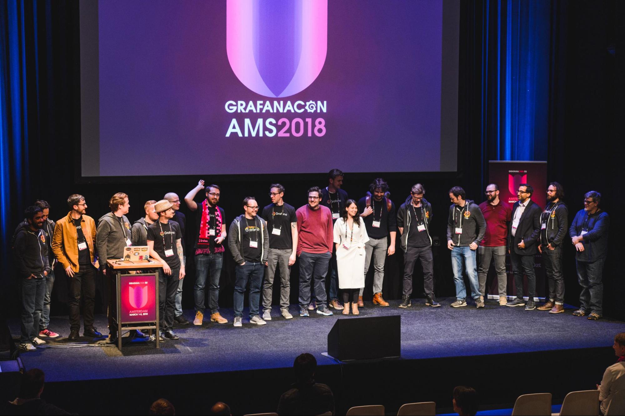 *The Grafana Labs team on stage at GrafanaCON 2018 in Amsterdam.* Photo of Grafana Labs team on stage at GrafanaCON 2018 in Amsterdam.