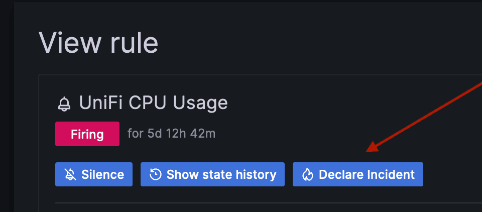 Screenshot with arrow showing decalre incident button in Grafana Alerting